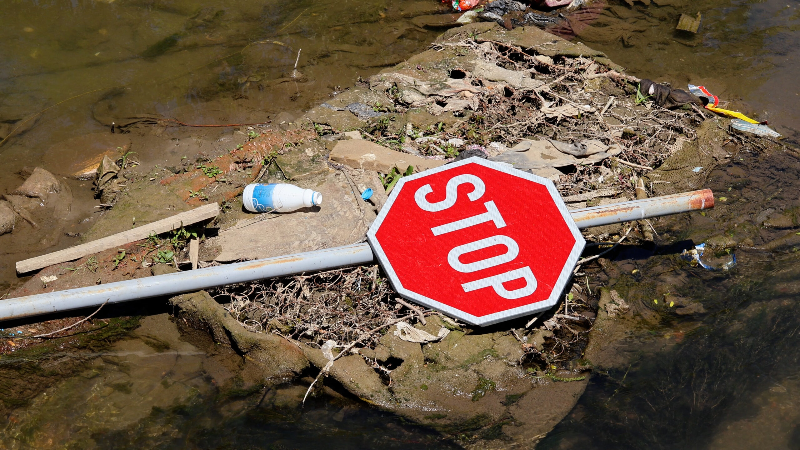 A STOP sign thrown into the Macedonian Kumanovka River